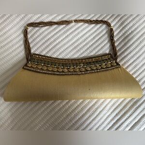 Elegant Gold Silk Clutch with Beaded Strap